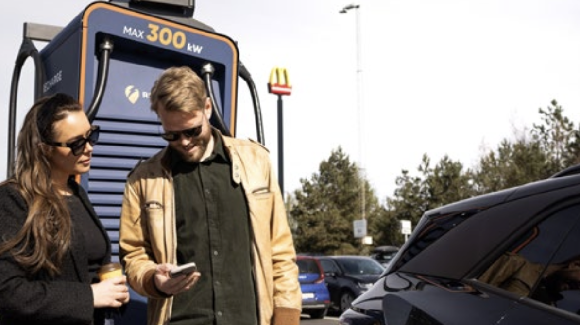 Driver tapping RFID card to start charging